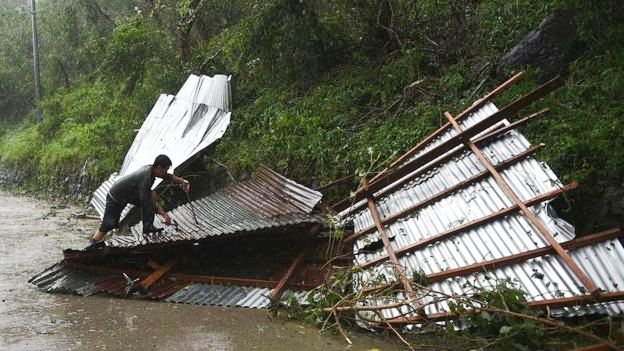 Bão Haima gây thiệt hại lớn tại Philippines - Ảnh 1.