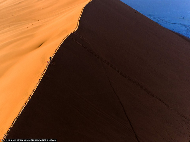 Khó tin với vẻ đẹp bất tận của cồn cát ở Namibia - Ảnh 4.