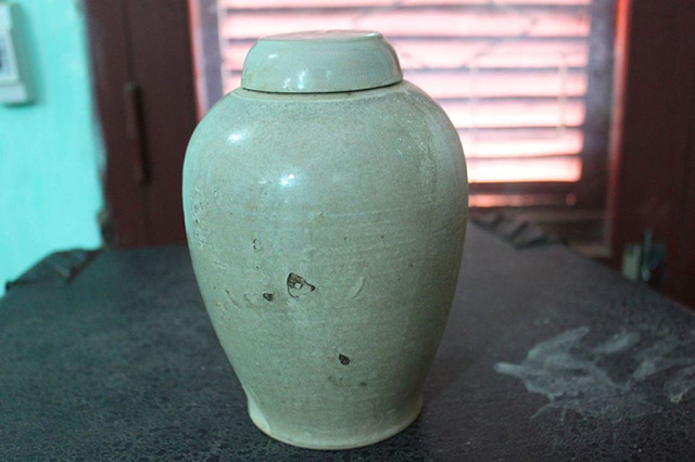 Phát hiện ngôi mộ cổ độc mộc chứa nhiều bình gốm - Ảnh 6. Phát hiện ngôi mộ cổ độc mộc chứa nhiều bình gốm - Ảnh 6.