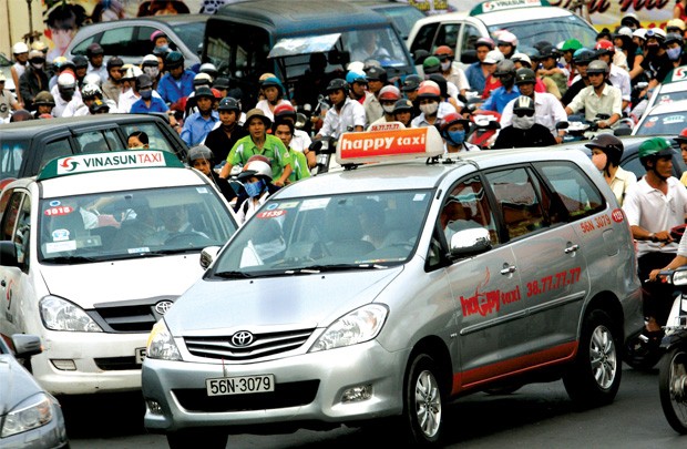 Uber, Grab thắng thế, nhưng taxi truyền thống bắt đầu phản công - Ảnh 4.