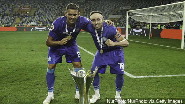 portos_mexican_midfielder_hector_herrera_r_and_portos_brazilian__911911 portos_mexican_midfielder_hector_herrera_r_and_portos_brazilian__911911
