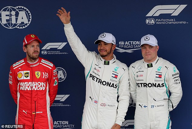 Lewis Hamilton giành vị trí xuất phát đầu tiên tại buổi đua phân hạng GP Brazil - Ảnh 1. Lewis Hamilton giành vị trí xuất phát đầu tiên tại buổi đua phân hạng GP Brazil - Ảnh 1.