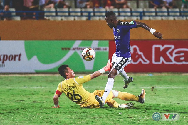 Ngược dòng thành công, CLB Hà Nội bất bại lượt đi V.League 2018 - Ảnh 21.