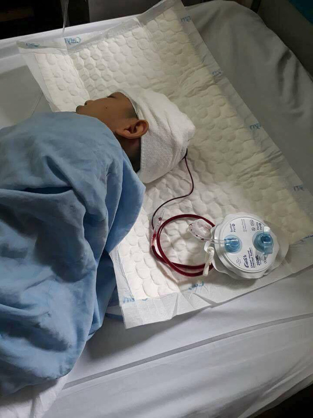 Tạm đình chỉ công tác thầy giáo bị phụ huynh tố tát học sinh gây chấn thương vùng đầu - Ảnh 2. Tạm đình chỉ công tác thầy giáo bị phụ huynh tố tát học sinh gây chấn thương vùng đầu - Ảnh 2.