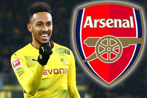 main-pierre-emerick-aubameyang-and-an-arsenal-badge main-pierre-emerick-aubameyang-and-an-arsenal-badge
