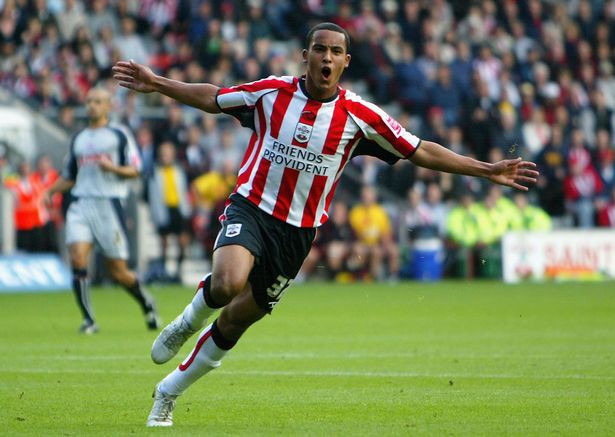 theo-walcott-of-southampton-celebrates-scoring-a-goal-during-the-coca-cola-championship-match-between-southampton-and theo-walcott-of-southampton-celebrates-scoring-a-goal-during-the-coca-cola-championship-match-between-southampton-and