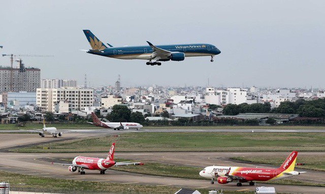 Hành khách Vietnam Airlines khởi hành từ Hà Nội được làm thủ tục qua điện thoại - Ảnh 1. Hành khách Vietnam Airlines khởi hành từ Hà Nội được làm thủ tục qua điện thoại - Ảnh 1.