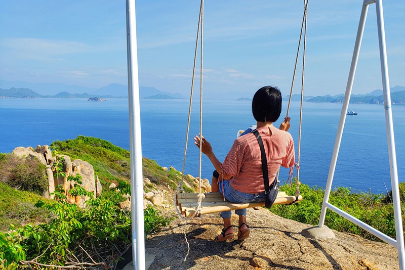 Riding a swing with breath-taking views
