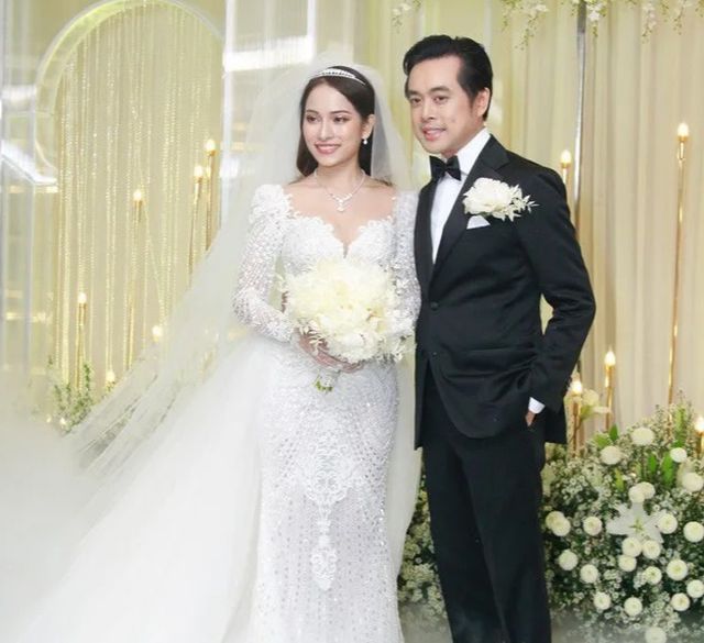 Chồng Thu Minh tháp tùng vợ dự đám cưới nhạc sĩ Dương Khắc Linh - Ảnh 1.