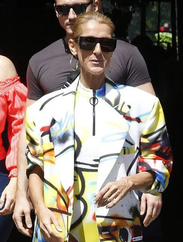 Celine Dion khoe chân dài với váy ngắn - Ảnh 7.