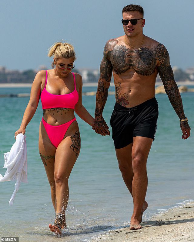 Olivia Buckland và chồng khoe dáng chắc khỏe cùng loạt hình xăm khủng - Ảnh 1.