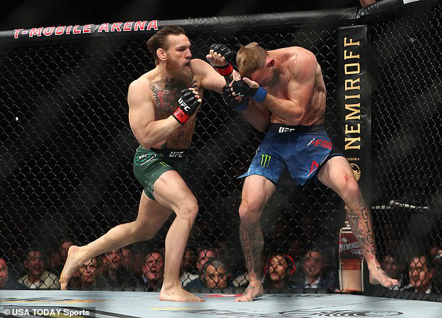 Connor McGregor hạ gục đối thủ chỉ sau 40 giây - Ảnh 2.