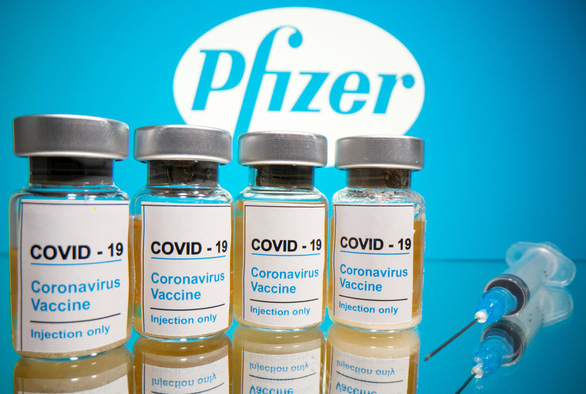 Vaccine COVID-19: Từ thử nghiệm thành công đến tiêm phòng diện rộng vẫn còn nhiều thách thức - Ảnh 1.