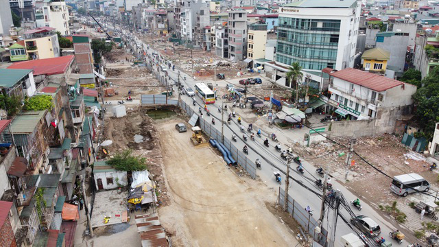 Bất cập giải phóng mặt bằng tạo ra các tỷ phú trên những con đường dát vàng - Ảnh 2. Bất cập giải phóng mặt bằng tạo ra các tỷ phú trên những con đường dát vàng - Ảnh 2.