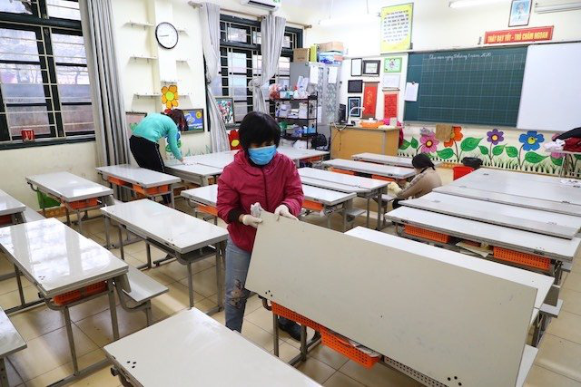 The disinfection work is implemented at the Nghia Tan Primary School in Hanois Cau Giay district. 