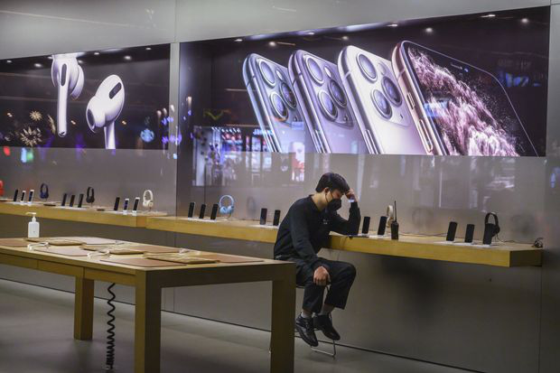 Apple đóng cửa toàn bộ cửa hàng và văn phòng tại Trung Quốc - Ảnh 1.