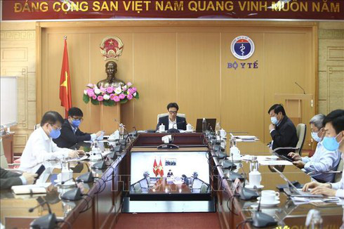 Deputy PM Vu Duc Dam warns of a long battle against COVID-19 in Vietnam 