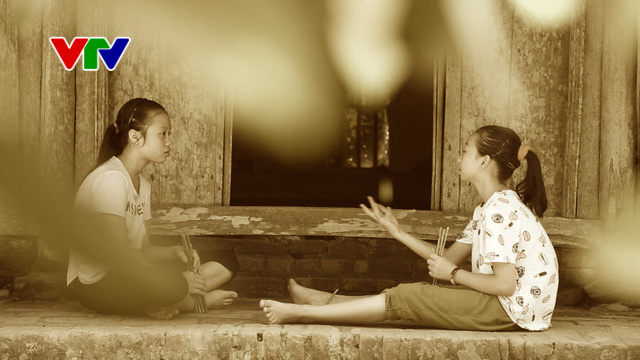 Chơi khăng gẫy răng cửa, chơi gụ bục tivi: Tuổi thơ dữ dội của trẻ em nông thôn xưa - Ảnh 2. Chơi khăng gẫy răng cửa, chơi gụ bục tivi: Tuổi thơ dữ dội của trẻ em nông thôn xưa - Ảnh 2.