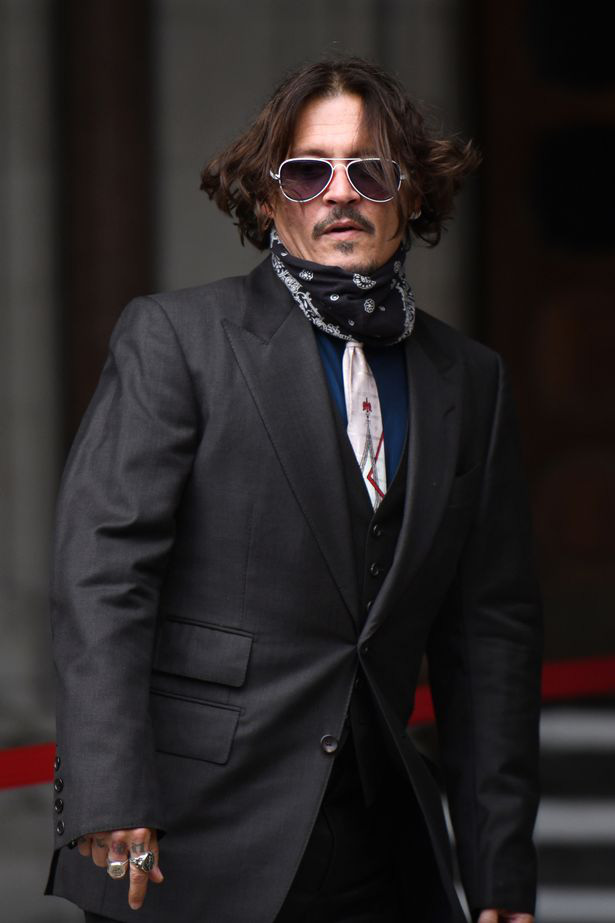 Johnny Depp phủ nhận cáo buộc bạo hành vợ cũ 14 lần - Ảnh 2.