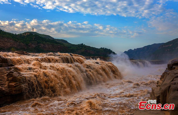 Chùm ảnh: Lũ lụt nghiêm trọng tại Trung Quốc, hơn 12 triệu người bị ảnh hưởng - Ảnh 12.