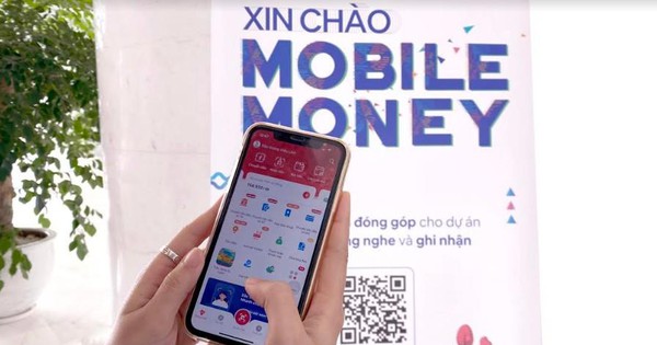 Người dân có thể thanh toán nhiều dịch vụ qua Mobile Money - Ảnh 1.