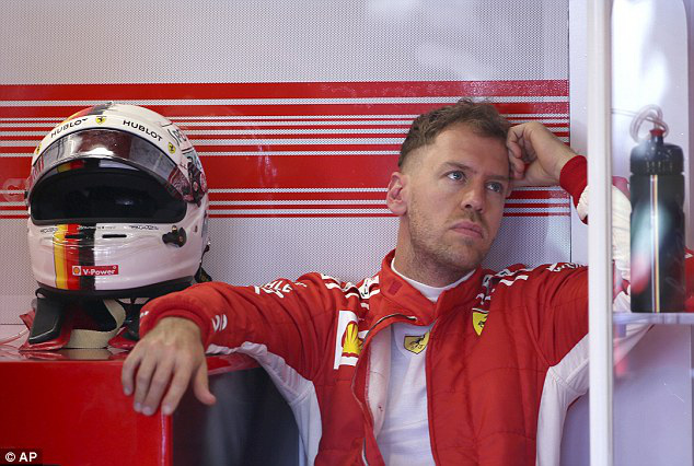 Sebastian Vettel không đặt nặng mục tiêu phải vượt qua Ferrari - Ảnh 1.