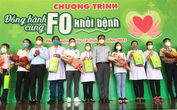 Đồng hành cùng F0 khỏi bệnh - Ảnh 1.