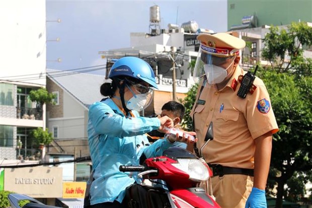 TP Hồ Chí Minh: Bổ sung nhóm đối tượng được phép lưu thông - Ảnh 1.