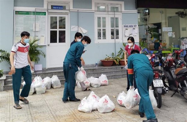 Đảm bảo chuỗi cung ứng lương thực đến tận tay người dân, duy trì giãn cách xã hội nghiêm ngặt - Ảnh 1.