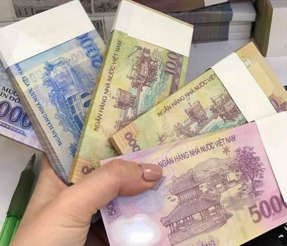 Đổi tiền mới dịp Tết, còn cần thiết không? - Ảnh 1. Đổi tiền mới dịp Tết, còn cần thiết không? - Ảnh 1.