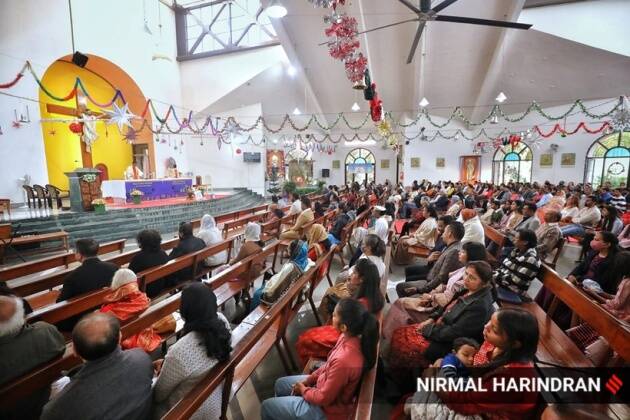 
After two years, people celebrated Christmas on Sunday across cities in a grand manner. Colourful lights adorned churches and people offered prayers and attended the Holy Mass at midnights. Malls and other buildings were also lit up. (Express Photo by Nirmal Harindran)
