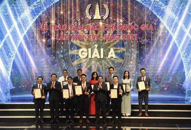 
This year, the National Press Awards presented 10 A prizes, 22 B prizes, 48 C prizes and 35 consolation prizes to a total 115 press works. (Photo: VNA)
