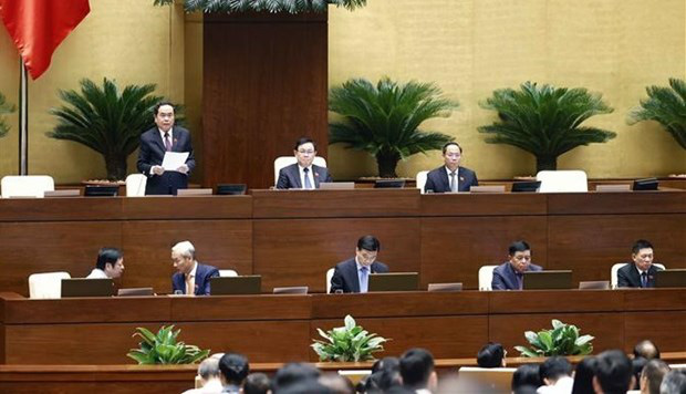 
National Assembly deputies discuss socio-economic affairs (Photo: VNA)
