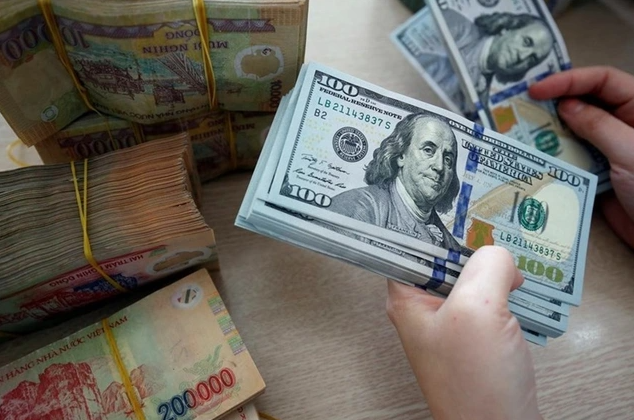 Tỷ giá USD/VND ổn định sau khi FED nâng lãi suất - Ảnh 1. Tỷ giá USD/VND ổn định sau khi FED nâng lãi suất - Ảnh 1.