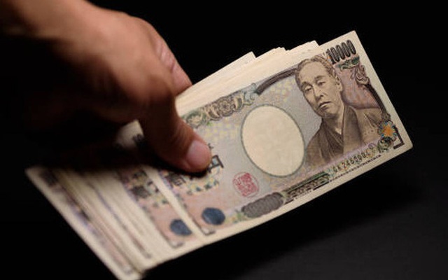 Đồng Yen xuống giá nhanh so với đồng USD - Ảnh 1.