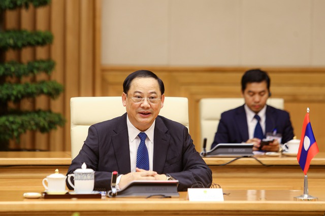Thủ tướng Phạm Minh Chính gặp làm việc với Thủ tướng Lào Sonexay Siphandone - Ảnh 2.