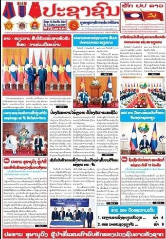 Lao media extensively cover Vietnamese Presidents visit - Ảnh 1.