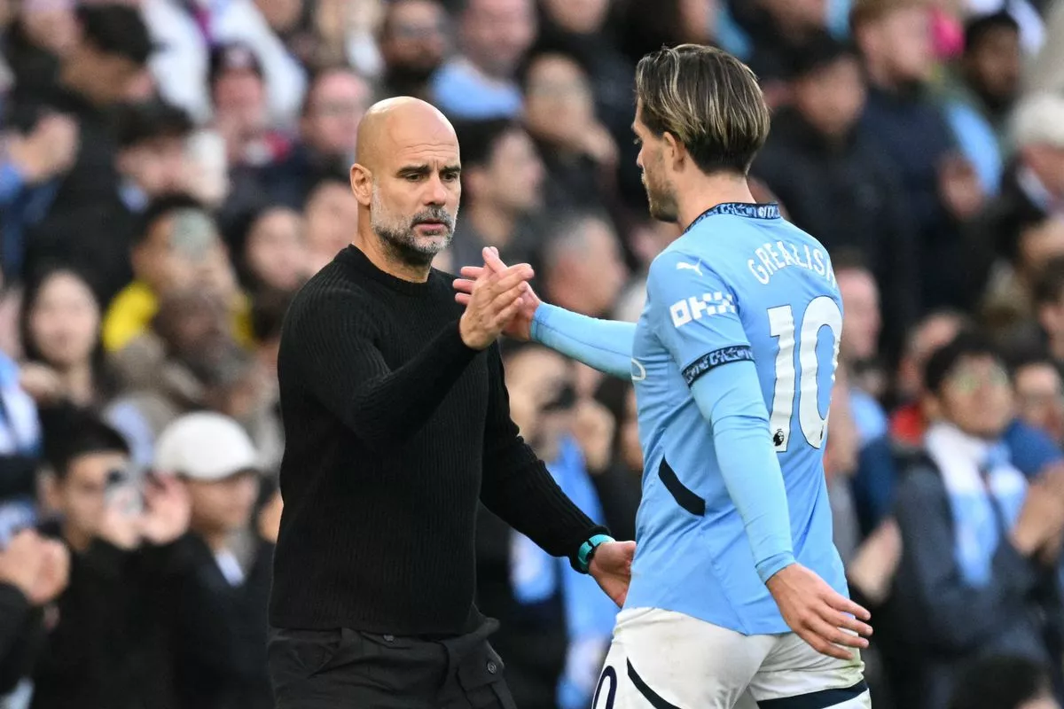 Pep Guardiola yêu cầu Jack Grealish chiến đấu để giành lại vị trí tại Man City - Ảnh 1.