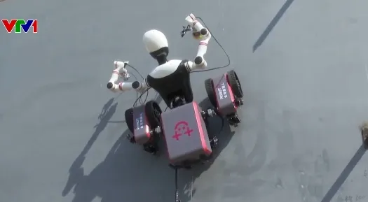 Robot "người nhện" leo tường - Ảnh 1.