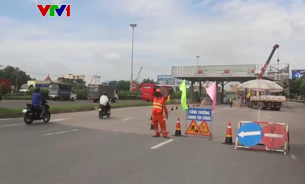 Tháo dỡ trạm thu phí cầu Đồng Na - Ảnh 1.