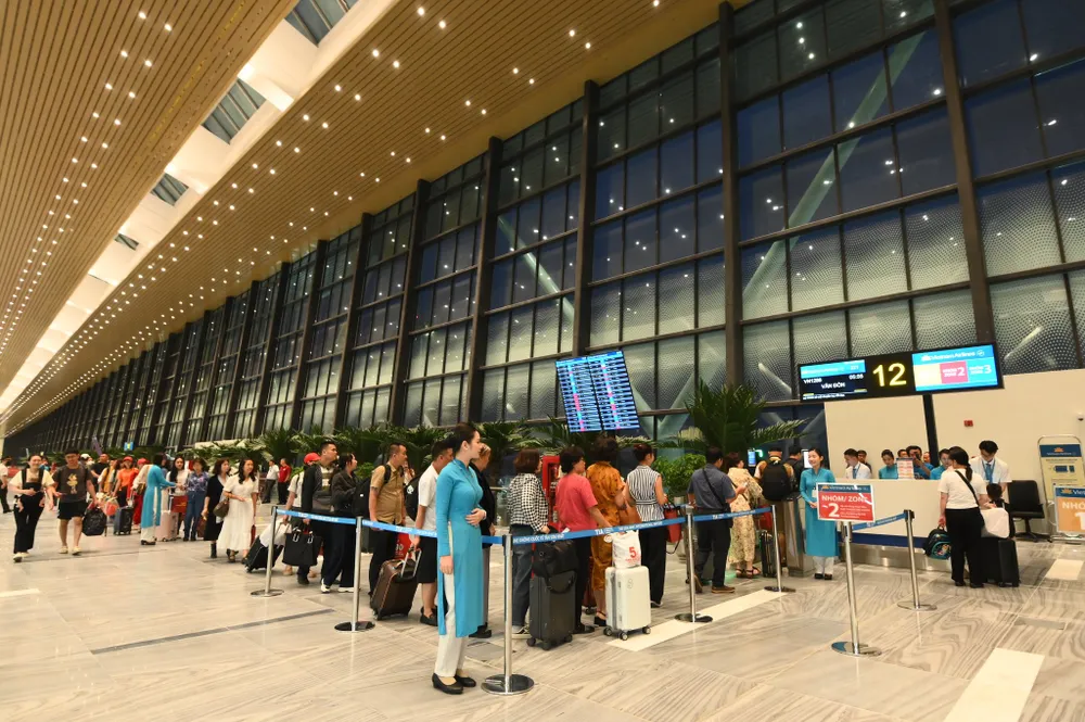 Nhà ga T3 Tân Sơn Nhất chính thức khai thác chuyến bay đầu tiên - Ảnh 8. Nhà ga T3 Tân Sơn Nhất chính thức khai thác chuyến bay đầu tiên - Ảnh 8.