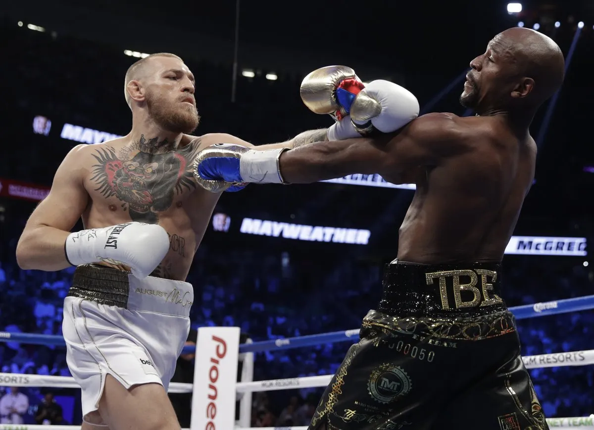 Trận quyền anh thế kỷ: Mayweather hạ McGregor bằng knock-out kỹ thuật - Ảnh 1. Trận quyền anh thế kỷ: Mayweather hạ McGregor bằng knock-out kỹ thuật - Ảnh 1.