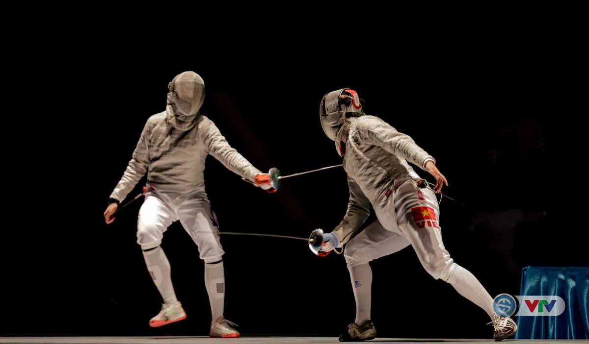 SEA Games 29: Thắng áp đảo đối thủ Thái Lan, Vũ Thành An giành HCV kiếm chém nam - Ảnh 4. SEA Games 29: Thắng áp đảo đối thủ Thái Lan, Vũ Thành An giành HCV kiếm chém nam - Ảnh 4.