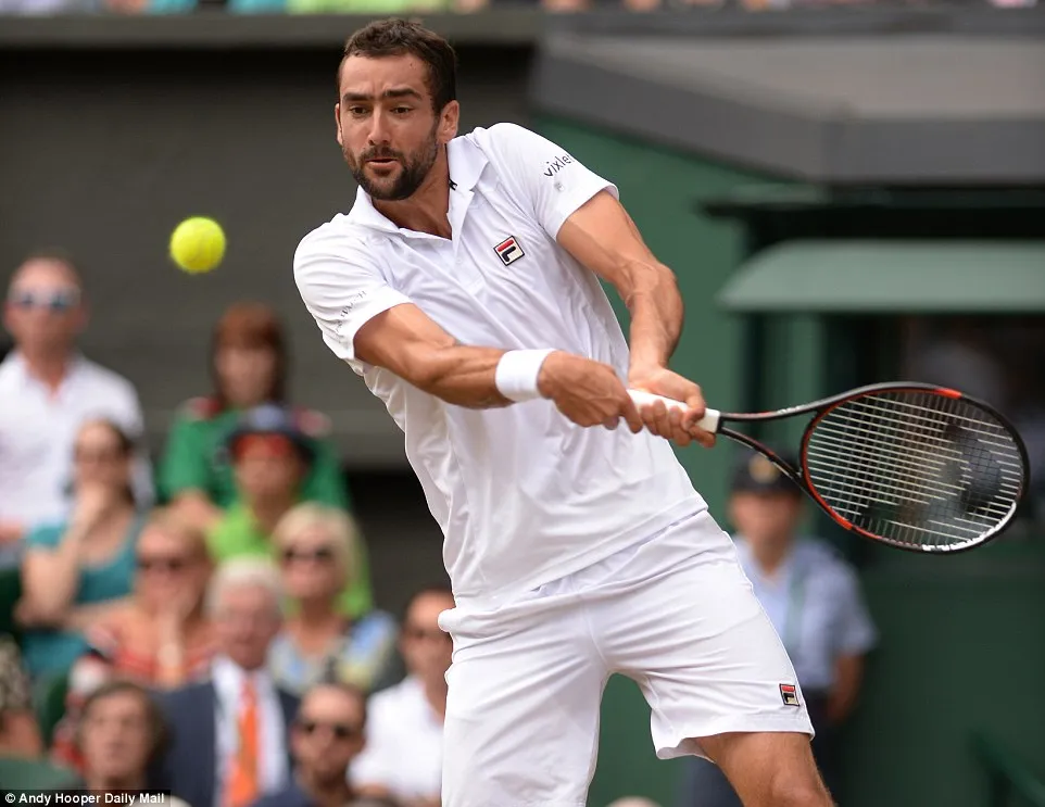 Ảnh: Những khoảnh khắc ấn tượng trong trận chung kết Wimbledon của Roger Federer - Ảnh 4.