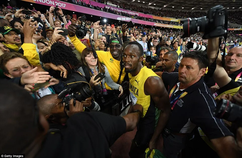 Giải điền kinh VĐTG: Usain Bolt thất bại ở đường chạy 100m sở trường - Ảnh 3. Giải điền kinh VĐTG: Usain Bolt thất bại ở đường chạy 100m sở trường - Ảnh 3.