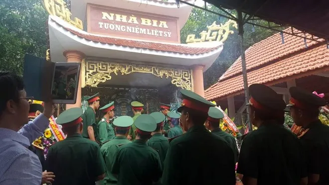 Sưởi ấm các linh hồn 21 liệt sĩ vô danh dưới chân núi Cà Tang - Ảnh 5.