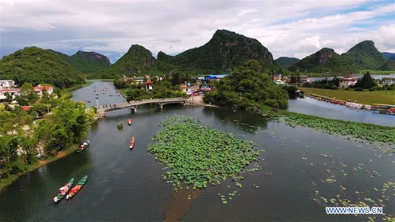 Mùa hè rực rỡ tại công viên sinh thái Puzhehei, Trung Quốc - Ảnh 10.