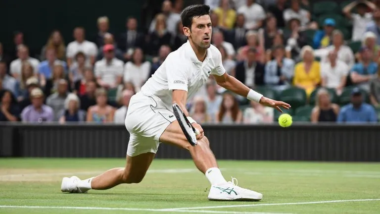 Thắng nghẹt thở trước Nadal, Djokovic vào chung kết Wimbledon 2018 - Ảnh 1. Thắng nghẹt thở trước Nadal, Djokovic vào chung kết Wimbledon 2018 - Ảnh 1.