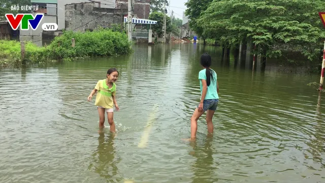 Hà Nội: Tập trung cao độ phòng chống dịch bệnh vùng ngập úng - Ảnh 3.