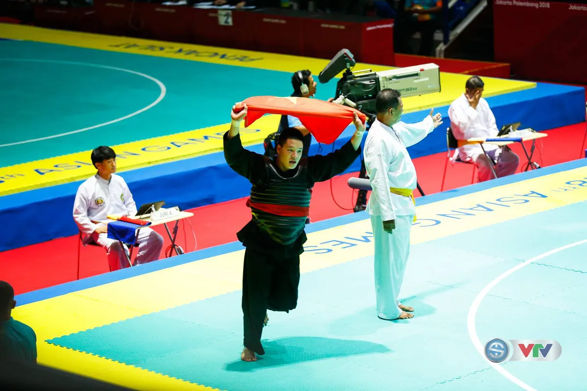 ASIAD 2018: Nguyễn Văn Trí đem về tấm HCV đầu tiên cho Pencak Silat - Ảnh 5. ASIAD 2018: Nguyễn Văn Trí đem về tấm HCV đầu tiên cho Pencak Silat - Ảnh 5.